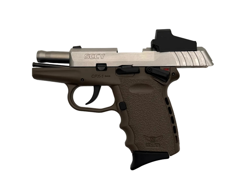 SCCY CPX-1 9mm semi-auto pistol with Crimson Trace red dot sight mounted on the slide, shown from a side angle.