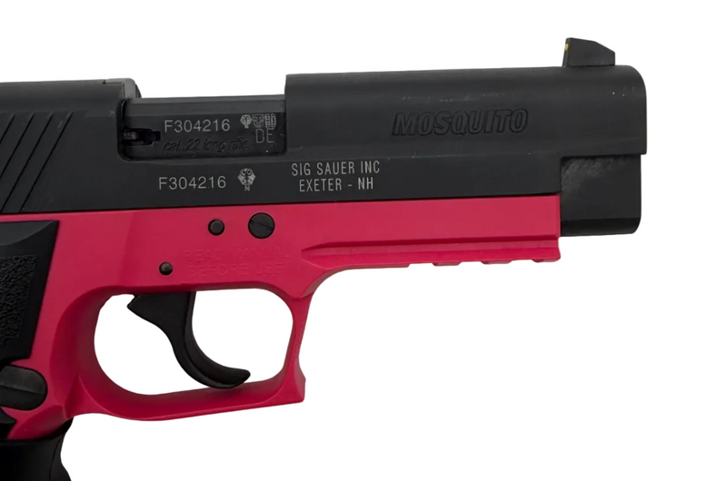 Sig Sauer Mosquito 22LR semi-auto pistol with black polymer grip and stainless steel barrel, shown in a close-up view.