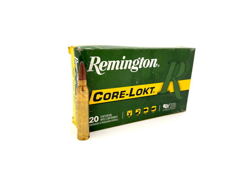 Remington Core-Lokt 300 Win Mag 180gr rifle ammunition, 20 cartridges, with metal casings and bullets visible.
