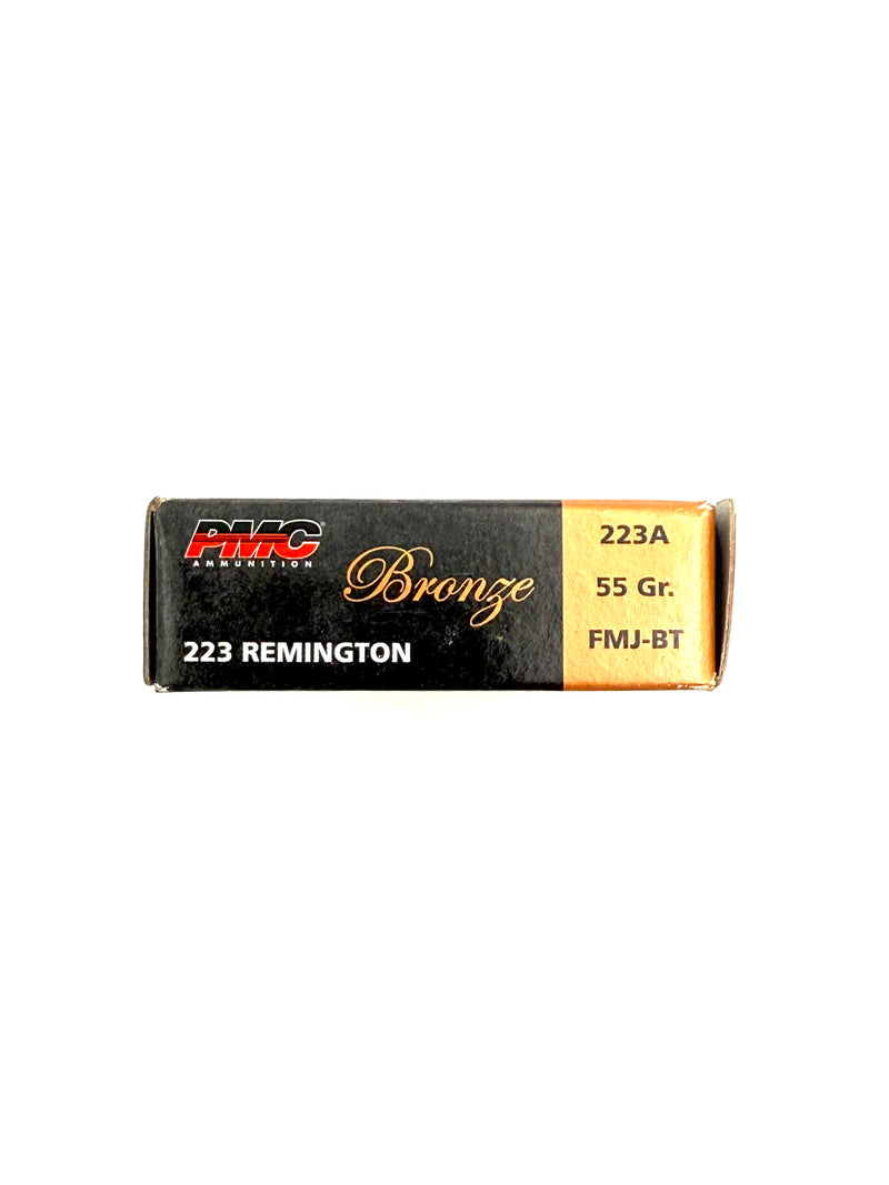 PMC Ammunition Bronze 223 Rem 55gr bullets, 20-count box, with brass casings and projectiles ready for use.