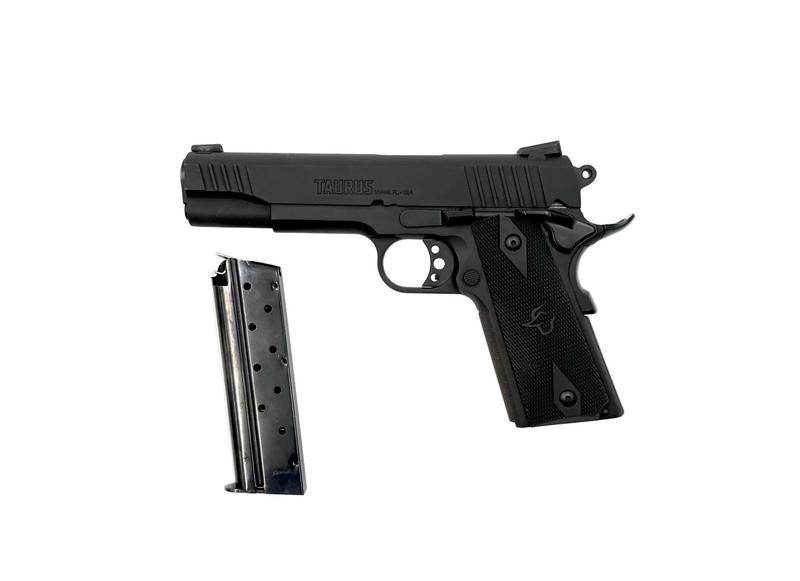 Black handgun with magazine on a white background