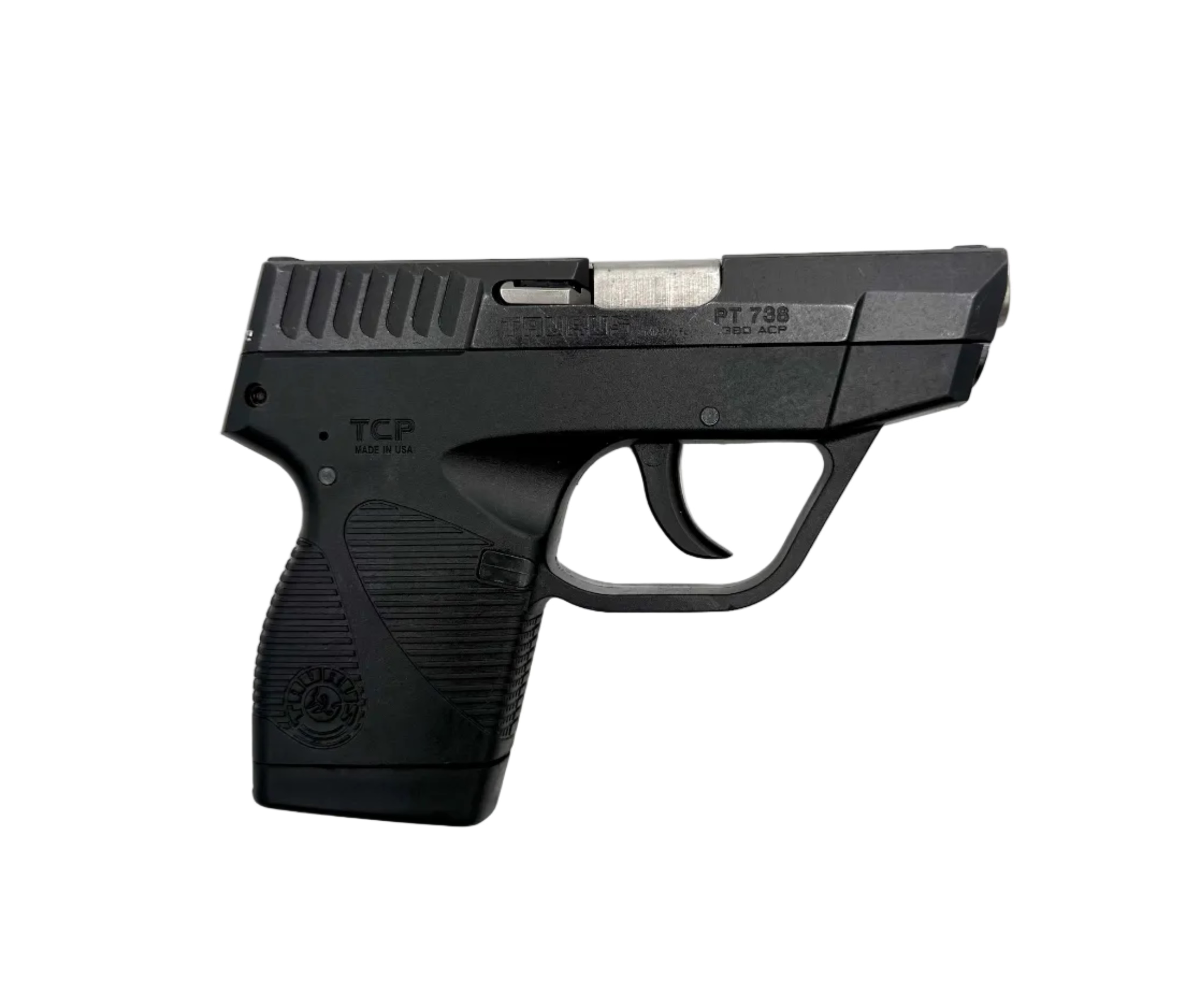 Close-up of Taurus 738 TCP semi-auto pistol with black finish, showing the grip and slide details.