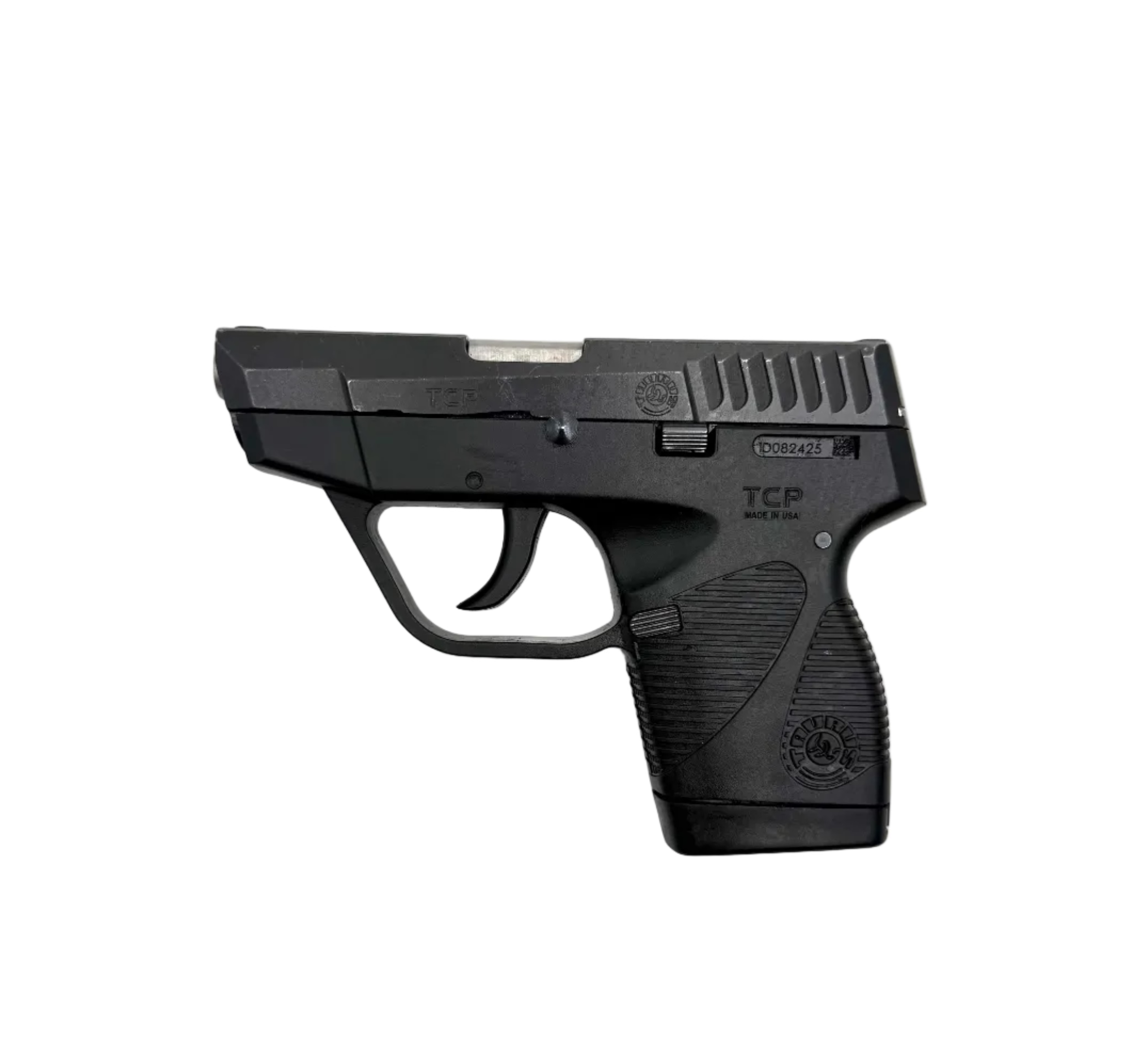Taurus 738 TCP semi-auto pistol with black polymer grip and stainless steel slide, shown from a side angle.