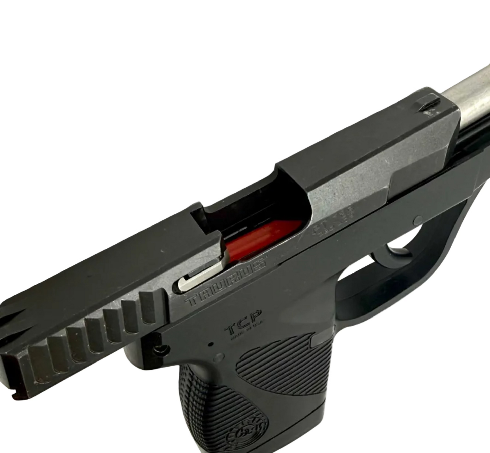 Taurus 738 TCP semi-auto pistol with black finish, compact design, and textured grip.
