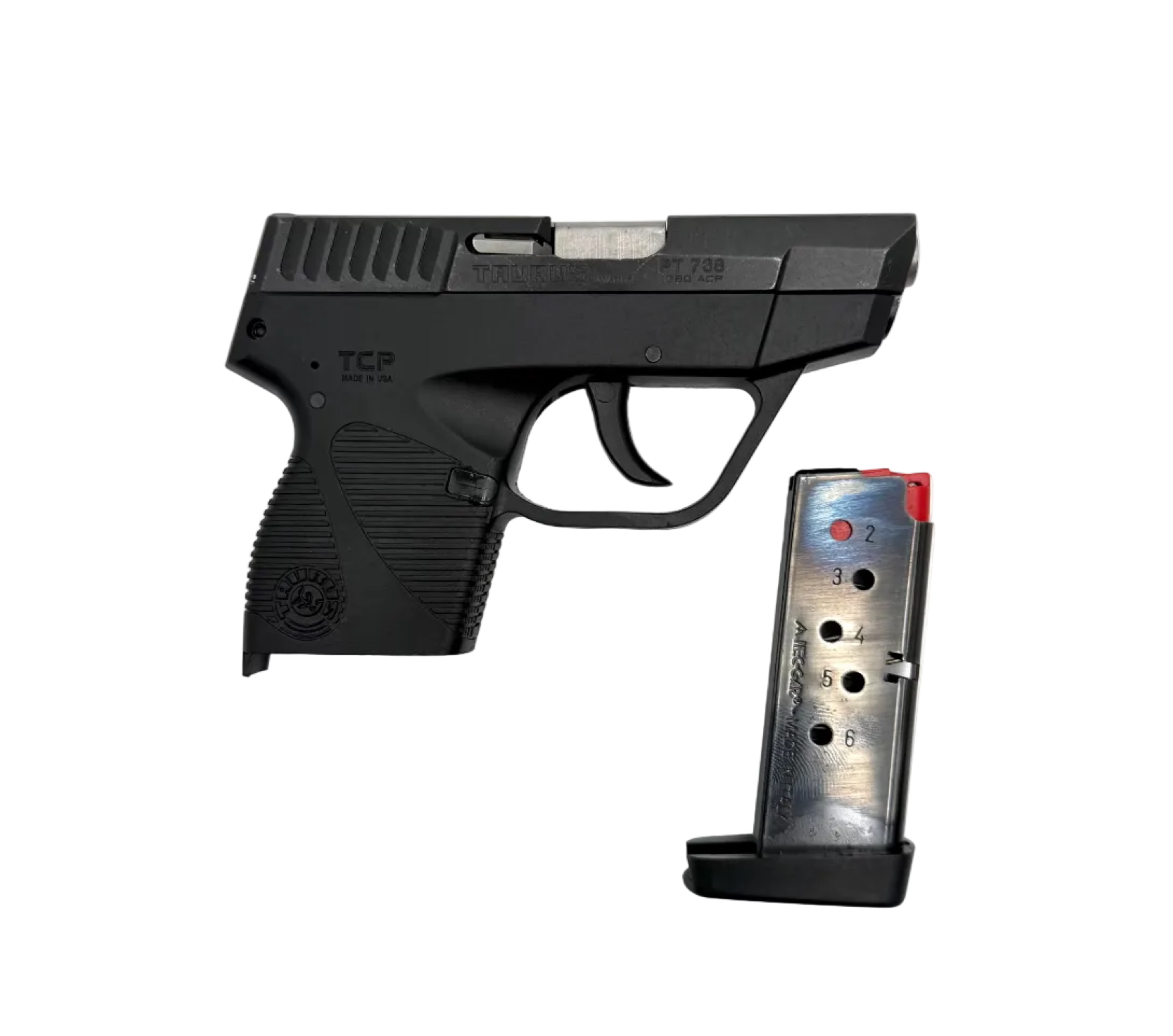 Taurus 738 TCP semi-auto pistol shown in a close-up, featuring a black polymer frame and stainless steel slide.