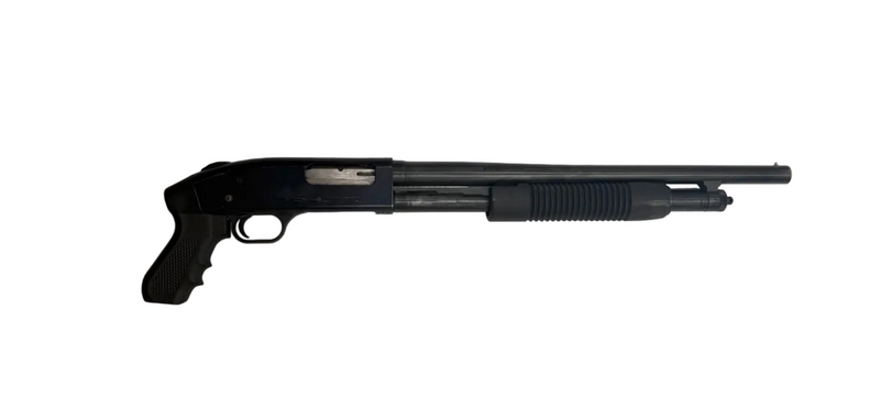 Mossberg 500 Cruiser 12 gauge pump-action shotgun with pistol grip, metal finish, and textured stock for improved handling.