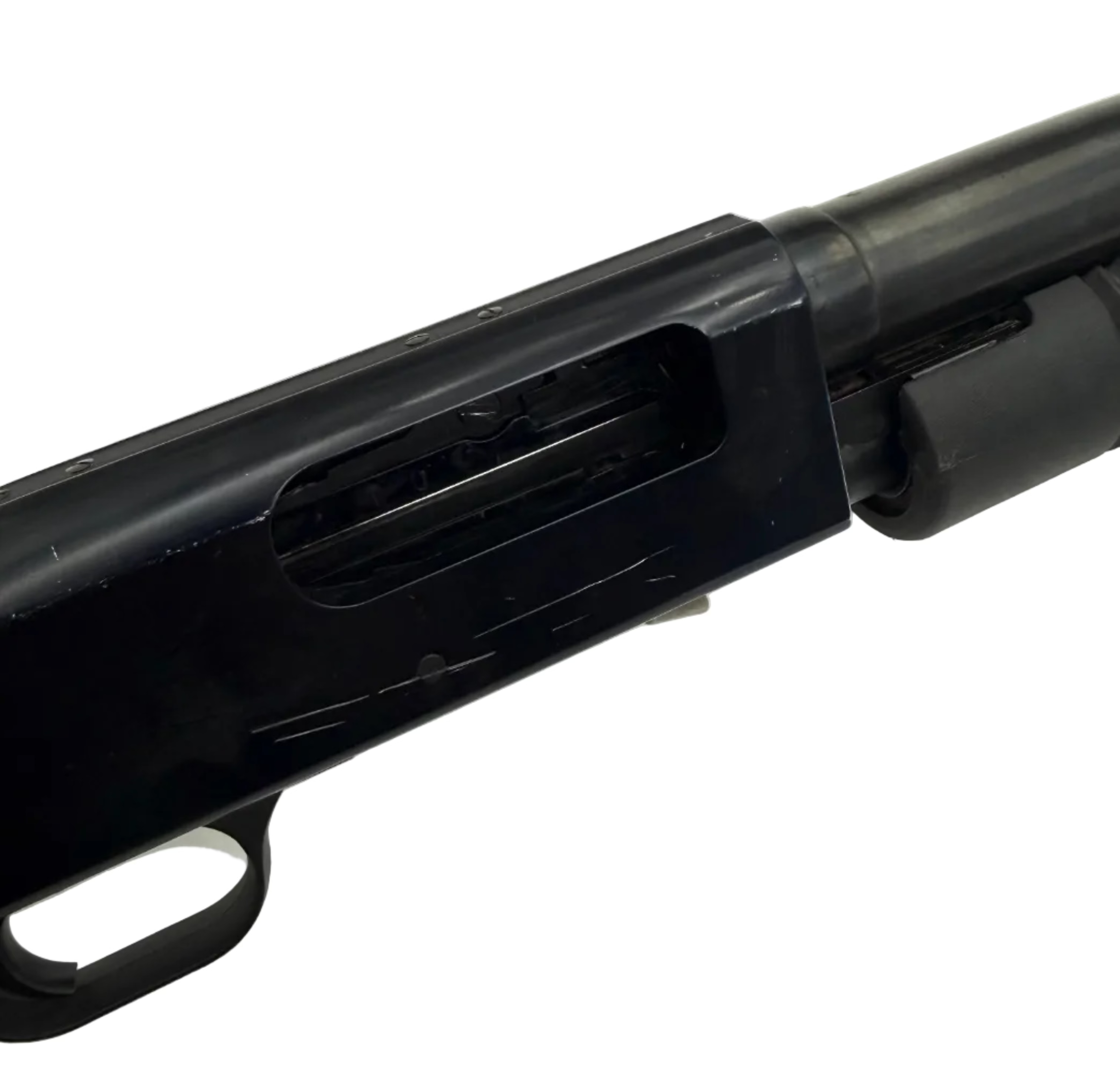 Mossberg 500 Cruiser pump-action 12 gauge shotgun with pistol grip, shown in a close-up view of the firearm.