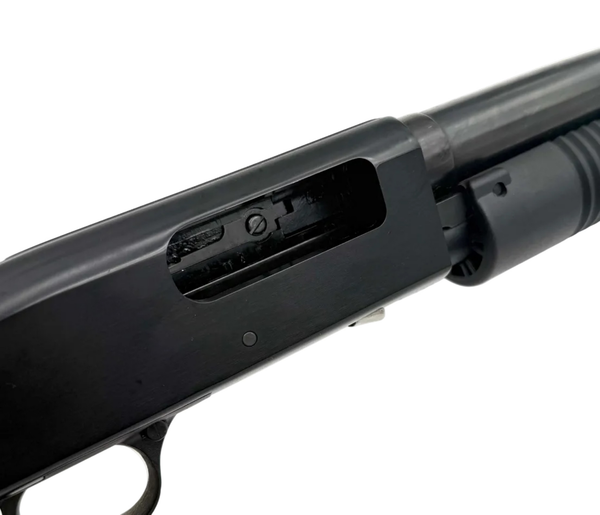 Mossberg Maverick 88 12 gauge pump action shotgun with pistol grip, black synthetic stock, and visible barrel in a close-up image.
