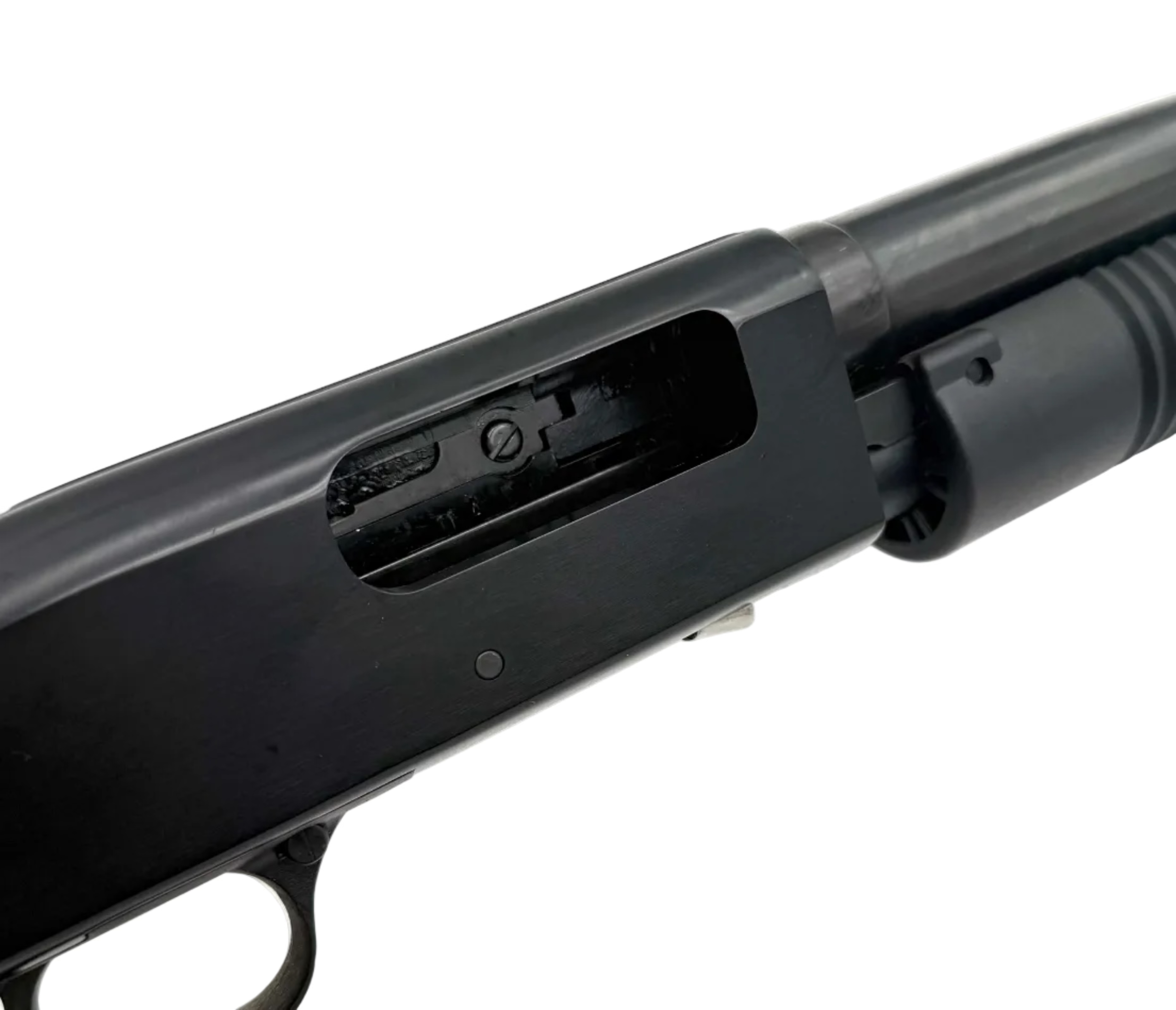 Mossberg Maverick 88 12 gauge pump action shotgun with pistol grip, black synthetic stock, and visible barrel in a close-up image.
