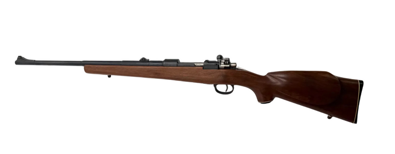 Spanish Mauser bolt action rifle by Fabrica De Armas La Coruna 1946 with wooden stock and metal barrel in 7.92x57mm caliber.