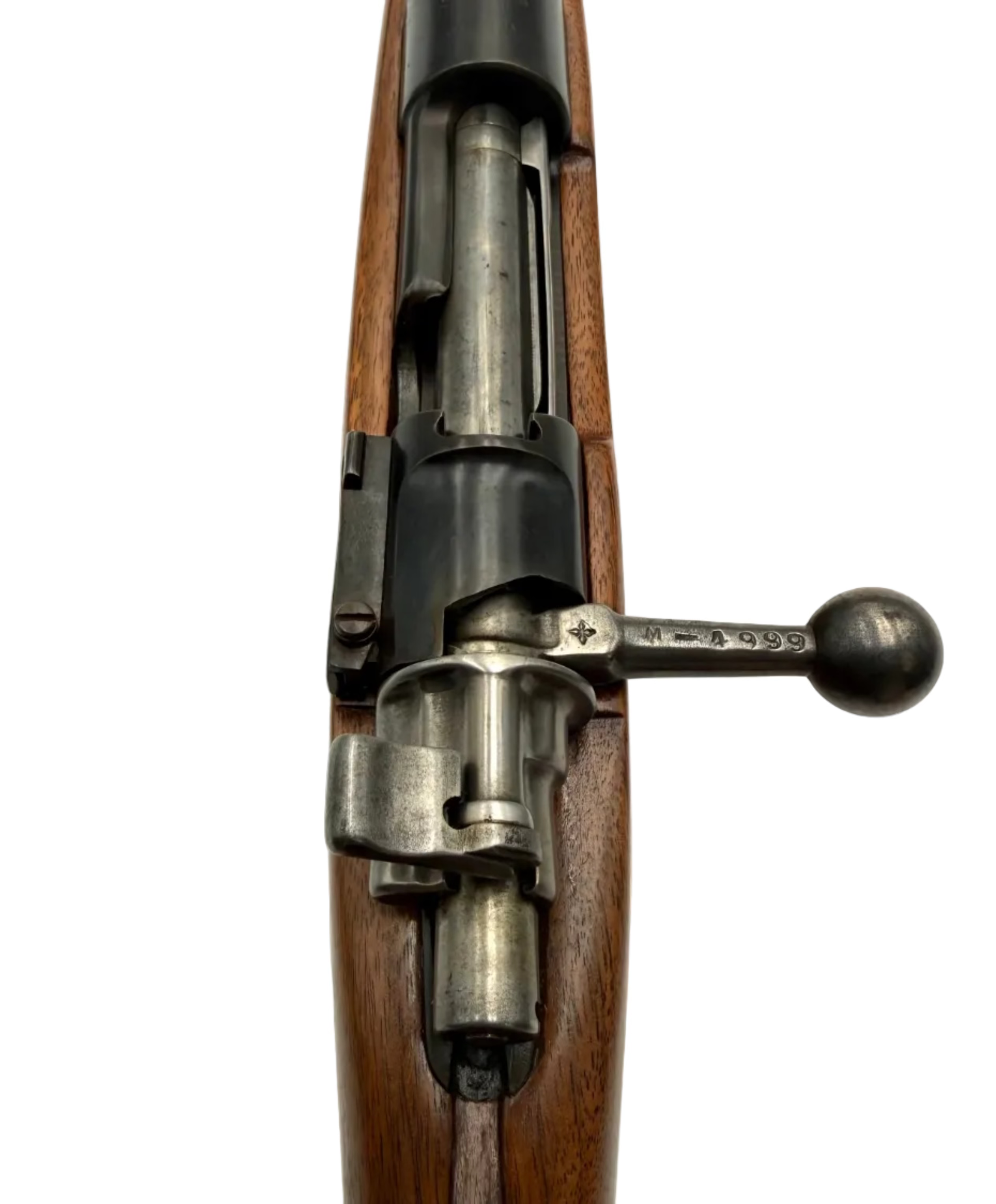 Fabrica de Armas La Coruna 1946 Spanish Mauser bolt action rifle with wooden stock and 7.92x57mm caliber, shown from side.