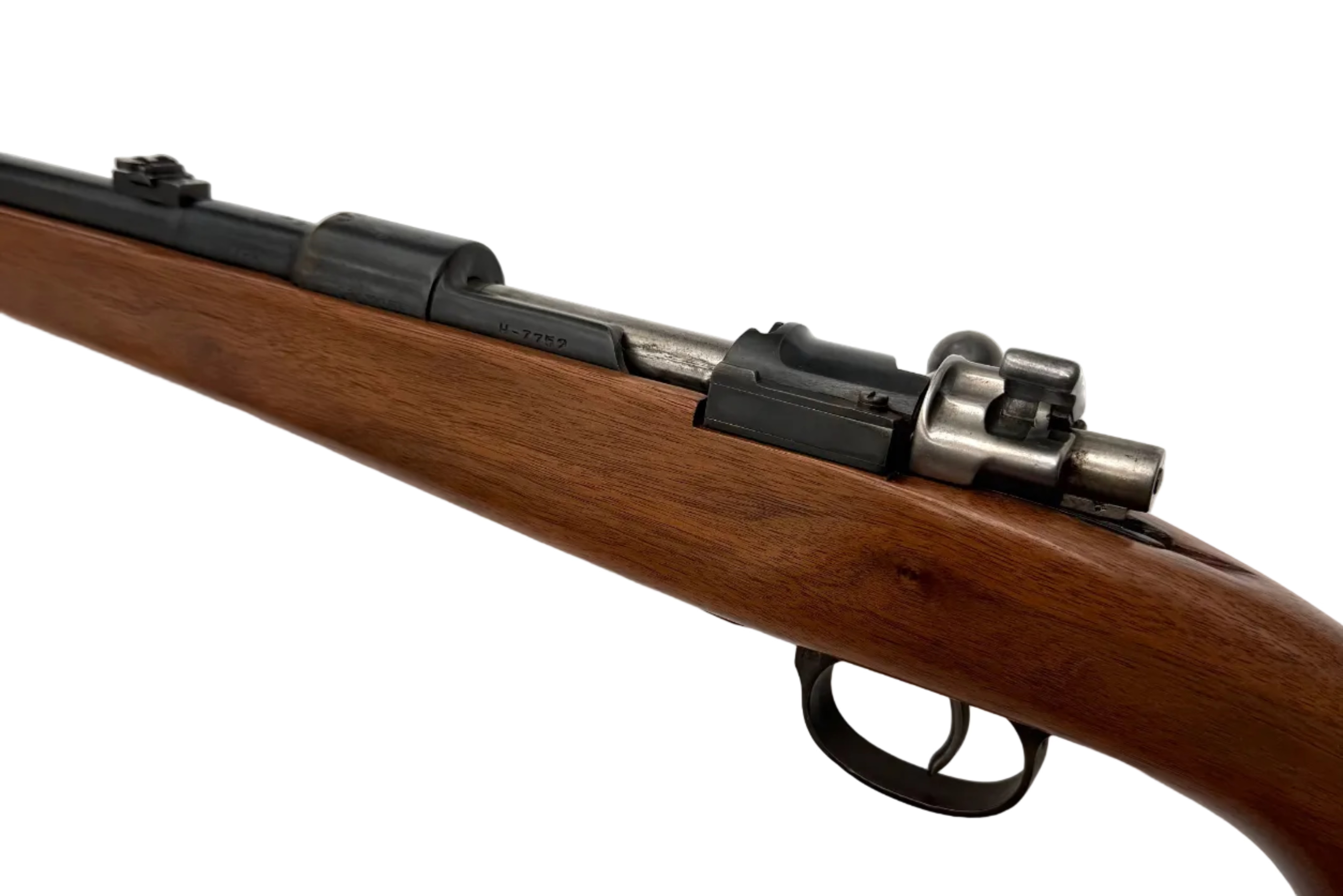 Spanish Mauser bolt action rifle by Fabrica De Armas La Coruna 1946, showing the rifle with wooden stock and metal barrel.