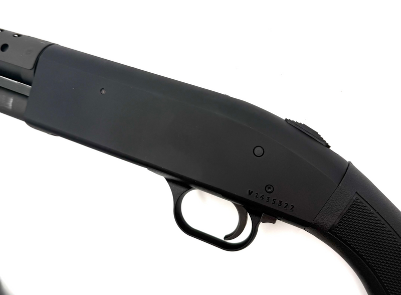 Mossberg 500 12 gauge pump action shotgun with wood stock and barrel, ready for hunting or home defense.