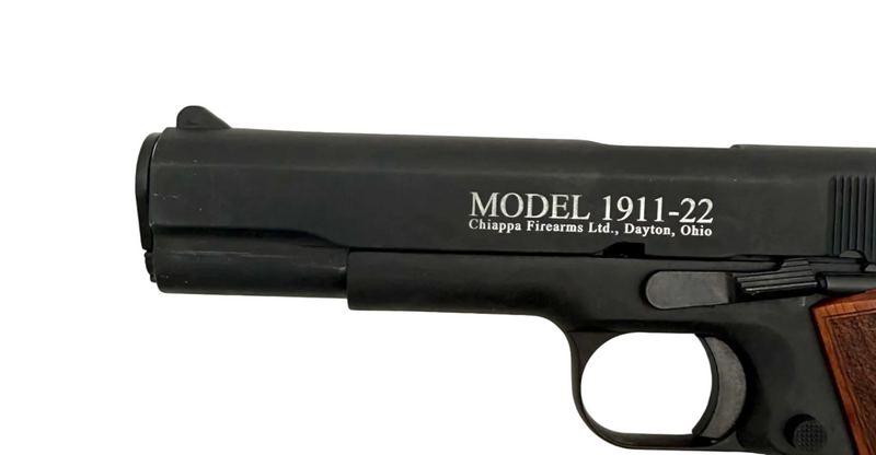 Chiappa 1911 .22LR semi-auto pistol with black finish, detailed grip, and metal construction, shown from a side angle.
