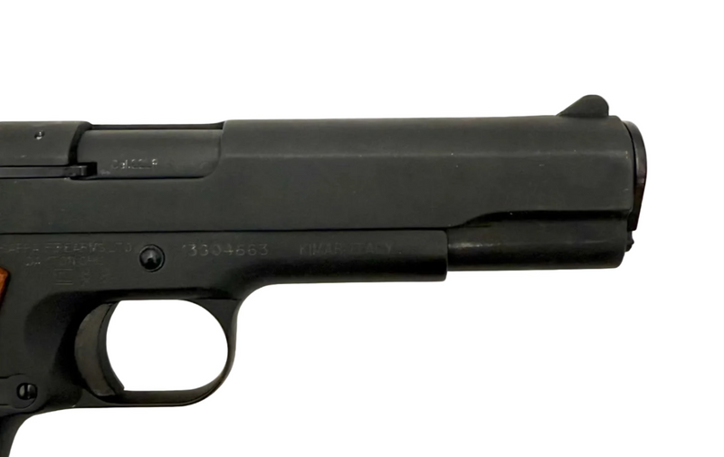 Chiappa 1911 .22LR semi-auto pistol showing black metal frame and grip with slide and trigger mechanism visible in the image.