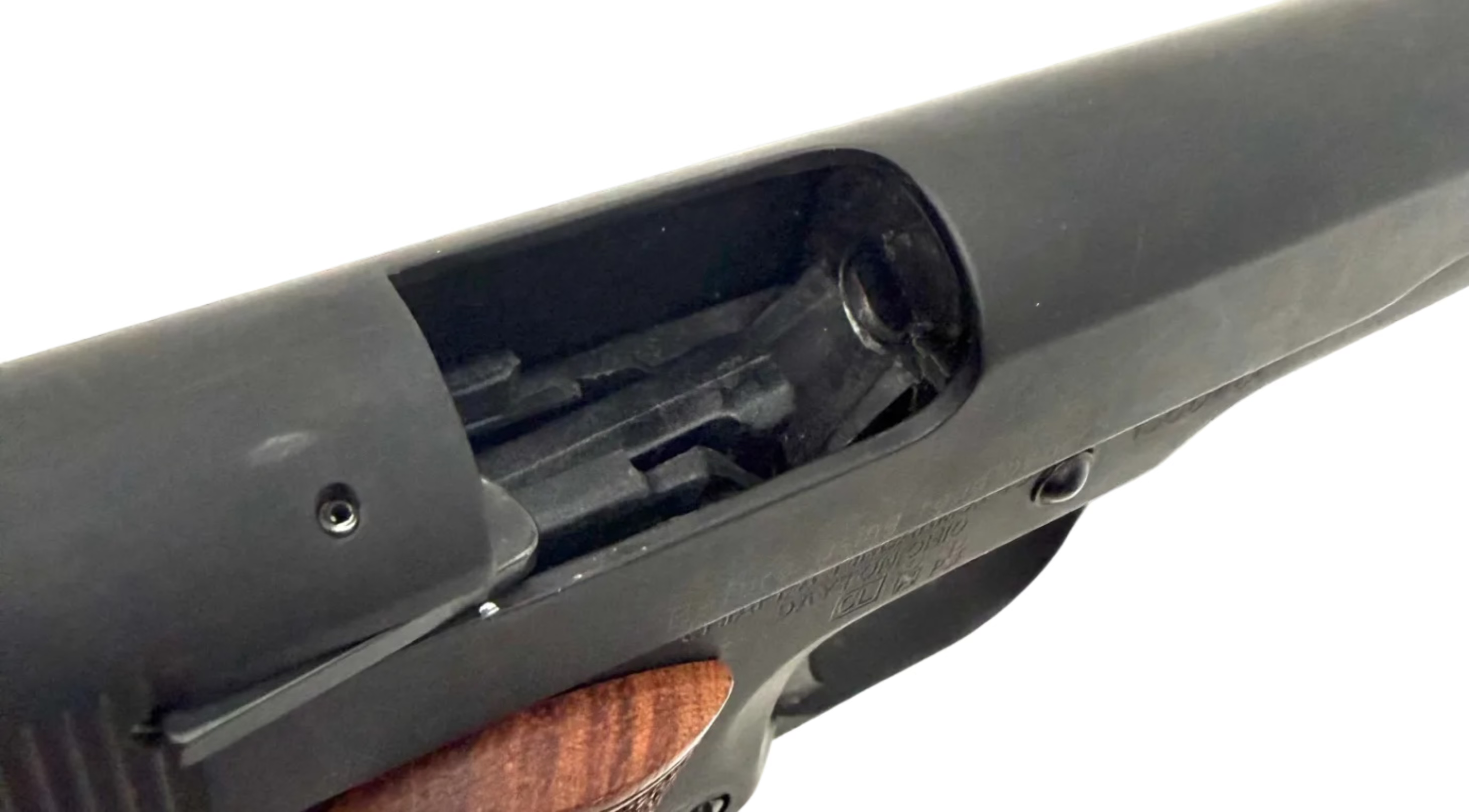 Chiappa 1911 .22LR semi-auto pistol with black finish and textured grip, displayed on a neutral background.