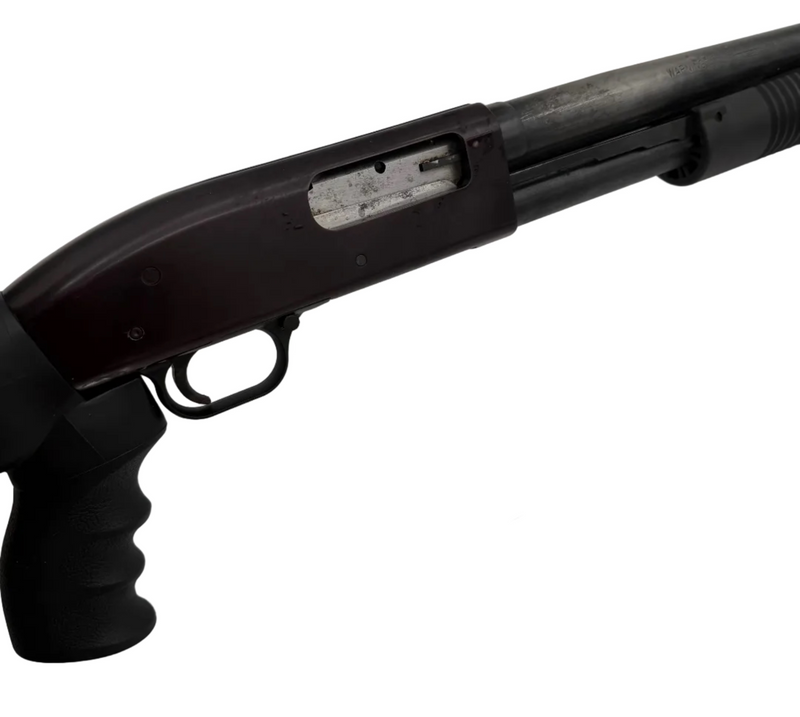 Mossberg Maverick 88 12 gauge pump-action shotgun with pistol grip, shown in a close-up image highlighting the firearm's details