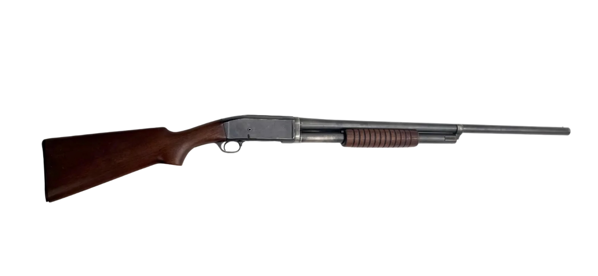 Remington Model 10 12 gauge pump-action shotgun with wooden stock and metal barrel, shown in a close-up view.