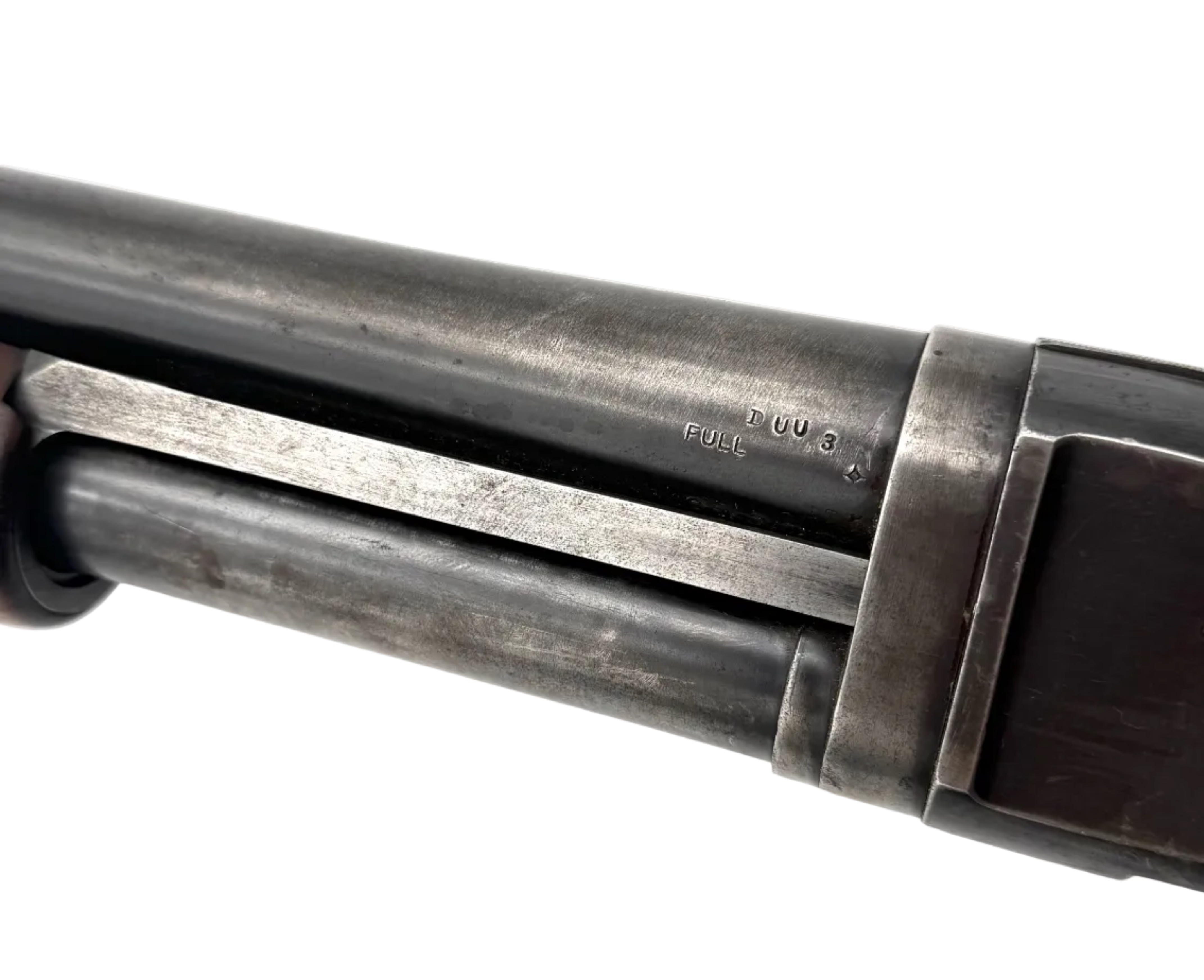 Remington Model 10 12 Gauge pump-action shotgun with wooden stock and metal barrel, ready for hunting or shooting sports.