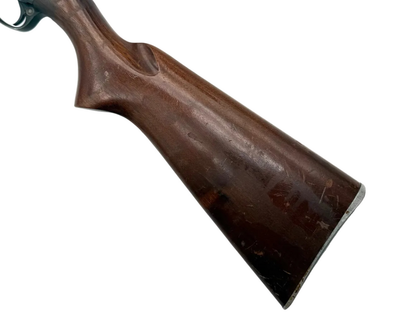Remington Model 740 .30-06 Springfield semi-automatic rifle with wooden stock and metal barrel, photographed from the side.