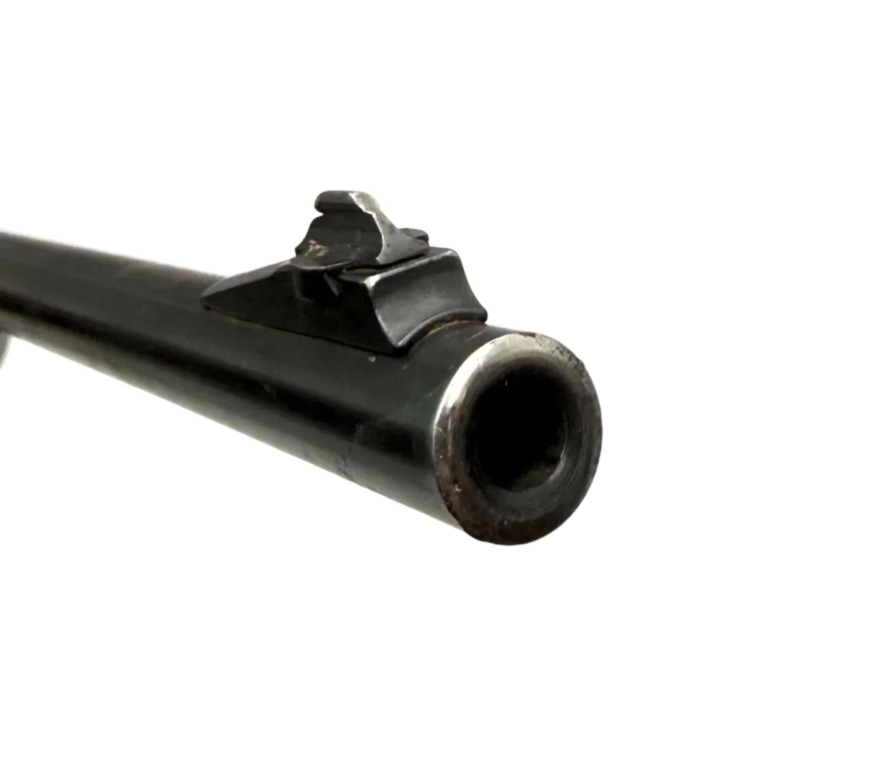Remington Model 740 .30-06 Springfield semi-auto rifle with wooden stock, mounted scope, and metal barrel.