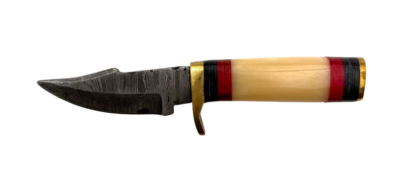 Close-up of a custom made Damascus knife with a patterned steel blade and wooden handle, showcasing craftsmanship and unique design.