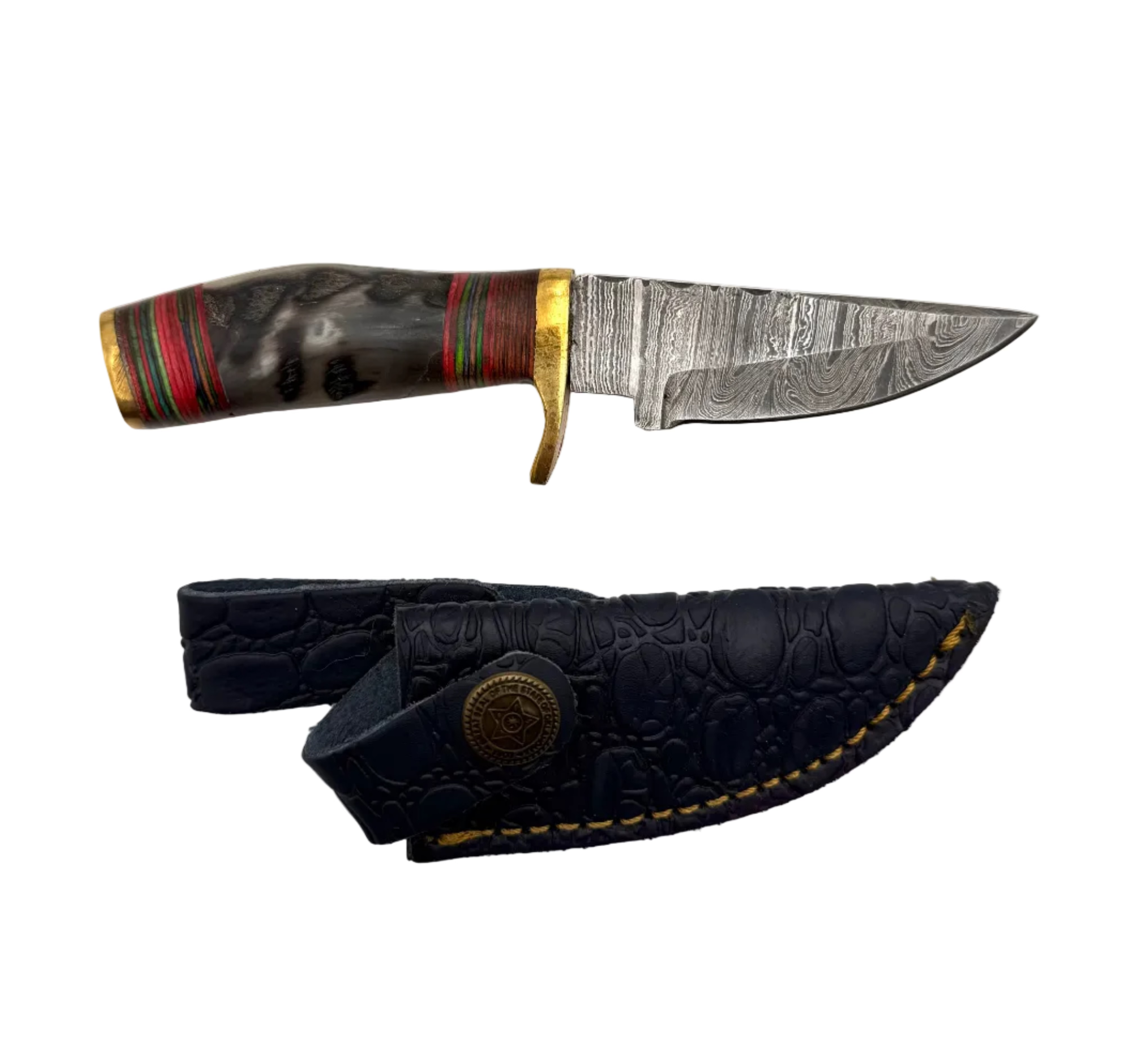 Close-up of a custom-made Damascus knife with a patterned blade and ergonomic handle, showcasing craftsmanship and unique design.