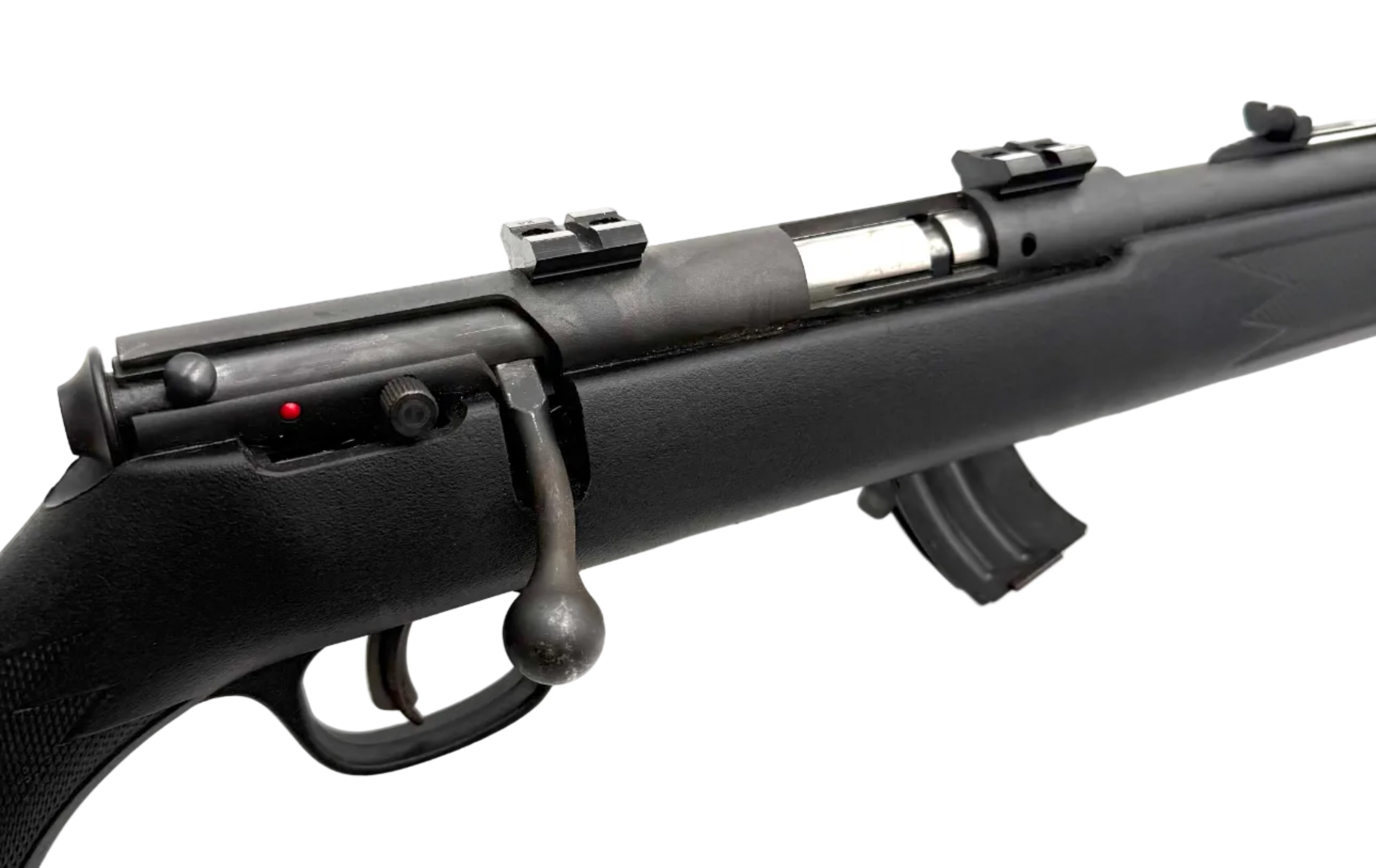 Savage Arms Mark II F .22LR bolt action rifle with wooden stock and metal barrel, ready for target shooting or hunting.