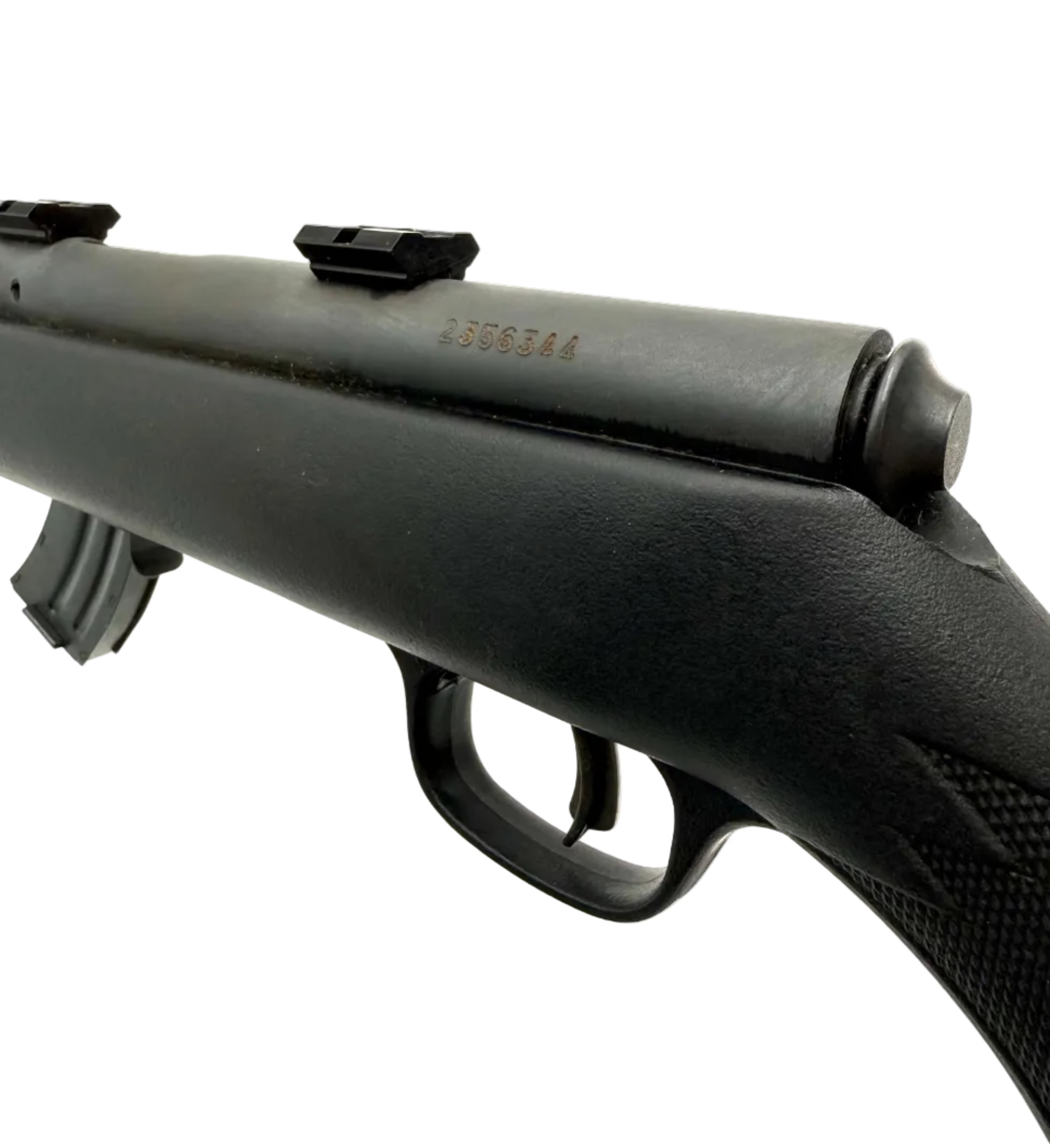 Savage Arms Mark II F .22LR bolt action rifle with wooden stock and iron sights, ready for target shooting or hunting.