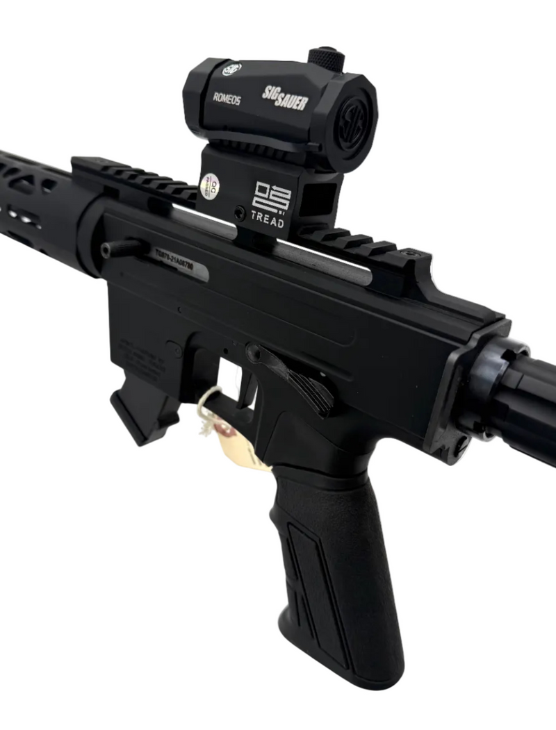 Rock Island Apintl TM22-A18 semi-auto rifle displayed, featuring a sleek design and tactical black finish.
