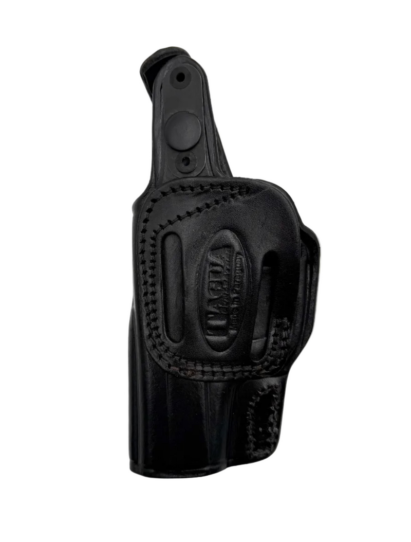 Black leather holster for Bersa 380 pistol by Tagua, designed for secure carrying and easy access.